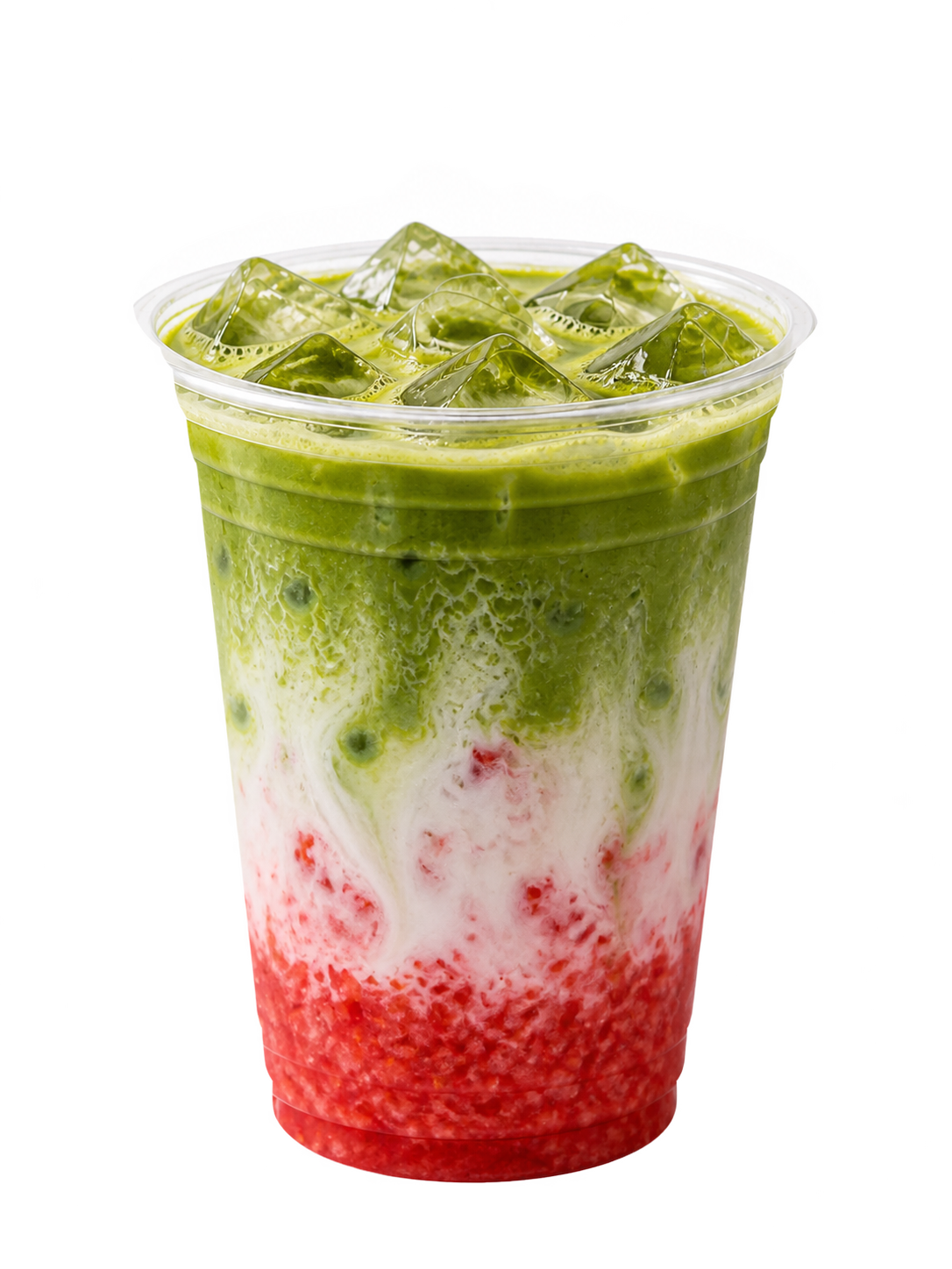 A clear cup of strawberry matcha latte, crushed strawberry purée at the base under milk, matcha and strawberry pieces